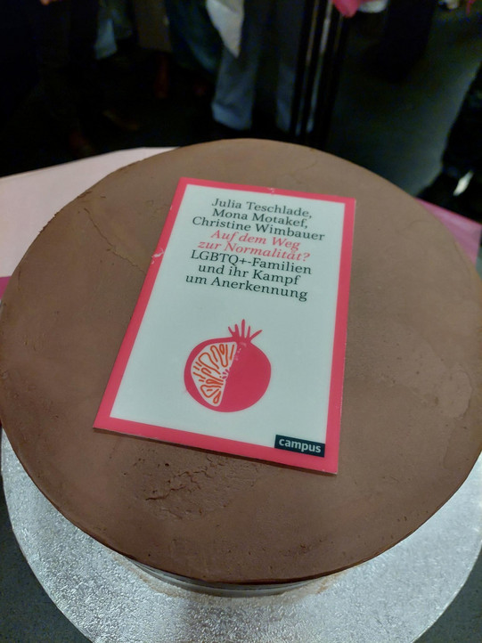A cake with the book cover on it.