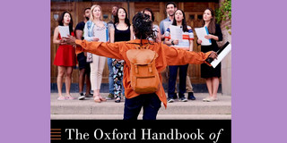 cover of handbook showing a community choir in front of a building